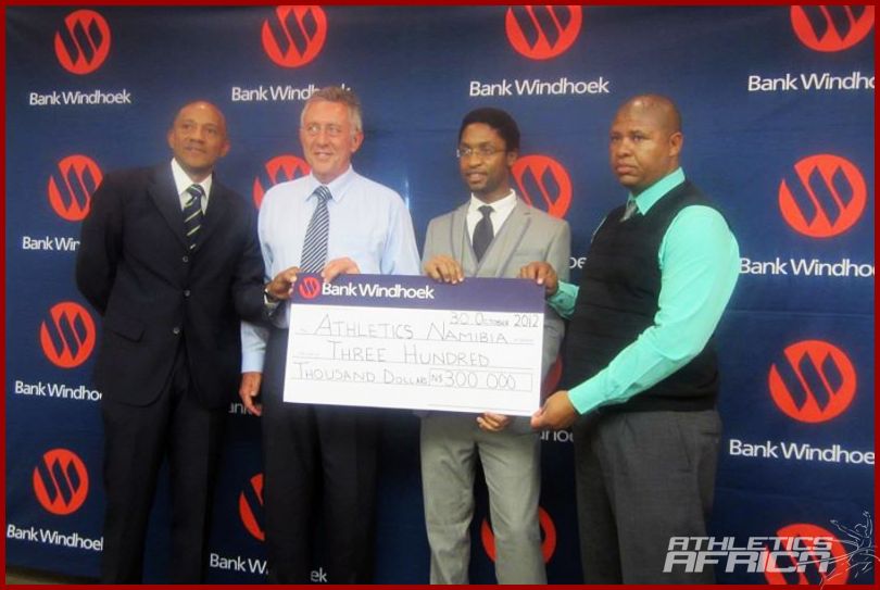 (L-R) Athletics Namibia President, Frank Fredericks, Bank Windhoek's MD Christo de Vries & others during the presentation/ Photo: AN