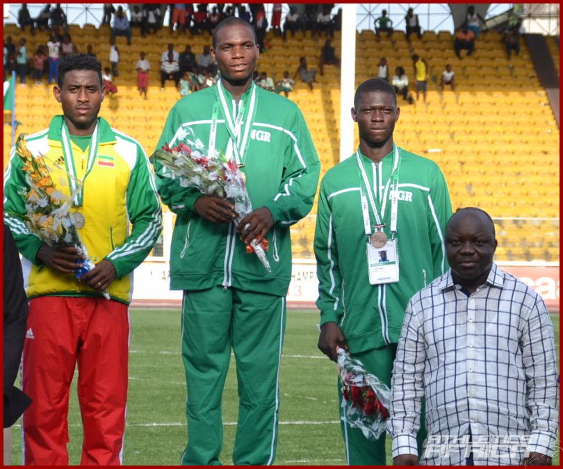 Governor of Delta State with the AYAC 2013 Boys 100m podium with Divine Oduduru in the centre / Photo: Segun Ogunfeyitimi