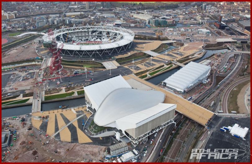 Aerial view of the Aquatics Centre and the Olympic Stadium / © ODA