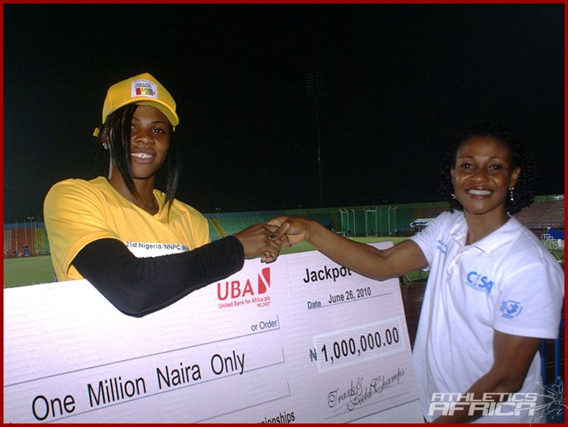 L-R: Passing the Baton - African sprint champion Blessing Okagbare receives a cheque from former African queen, Mary Onyali, at the All-Nigeria Championships in Calabar last year.