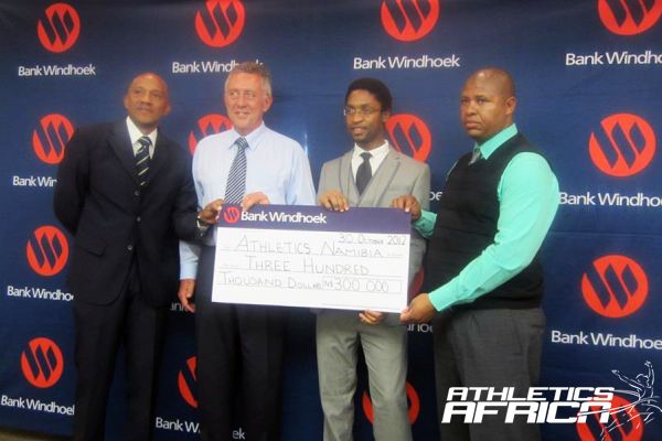 (L-R) Athletics Namibia President, Frank Fredericks, Bank Windhoek's MD Christo de Vries & others during the presentation/ Photo: AN